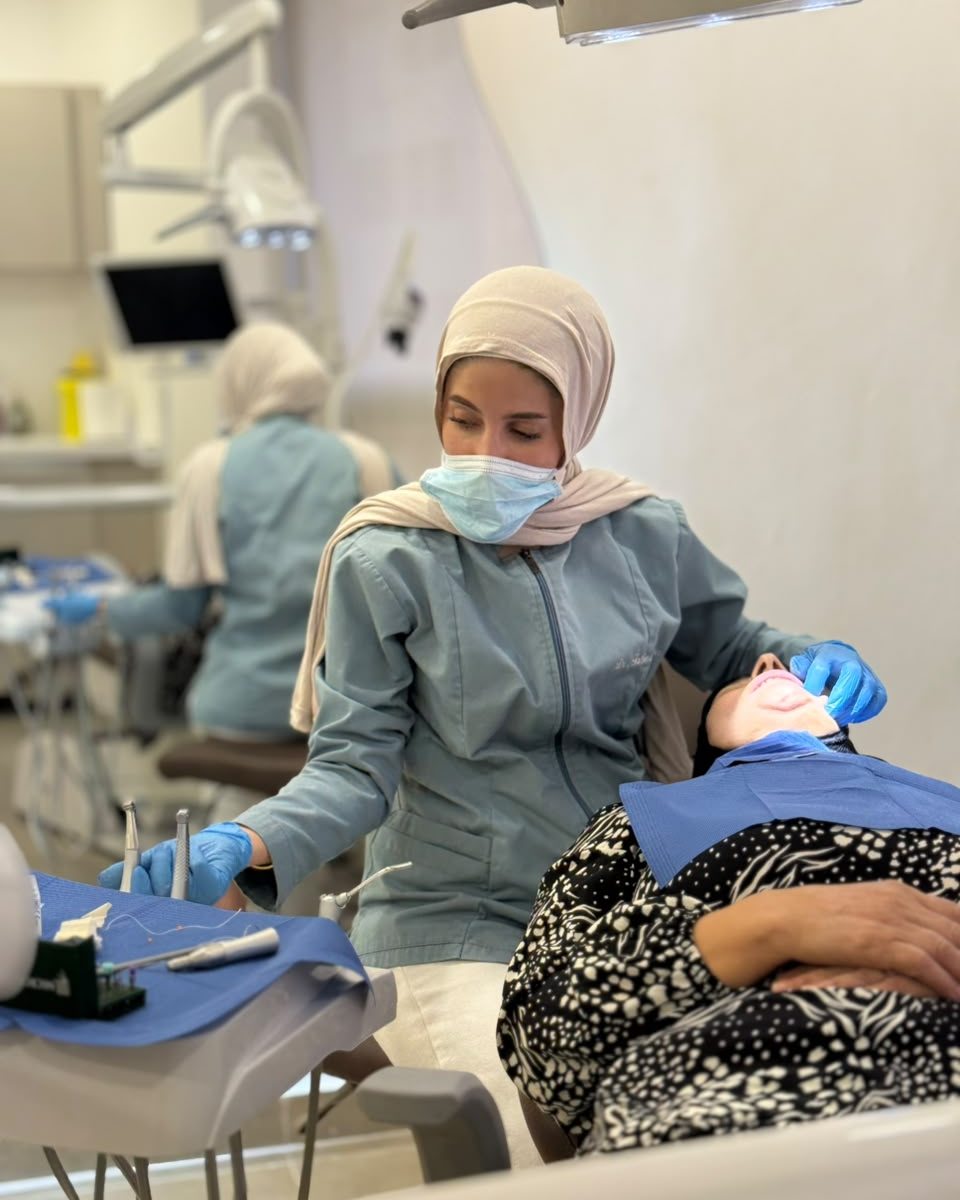 Dr. Fatima Nasser treating a patient in the clinic